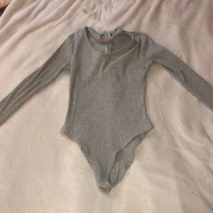 Grey V neck cut out body suit